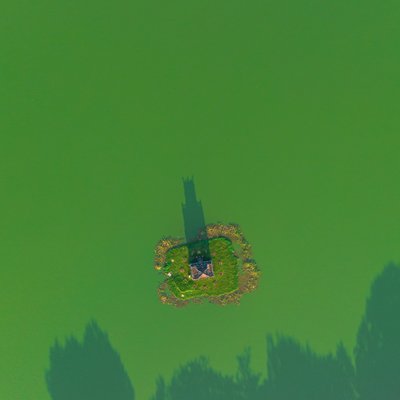 Hình ảnh chụp từ trên cao cho thấy Tháp Rùa nằm trên một đảo nhỏ giữa hồ nước xanh mướt. Khung cảnh mang lại cảm giác yên bình và tĩnh lặng với ánh sáng mềm và bóng đổ rõ nét.